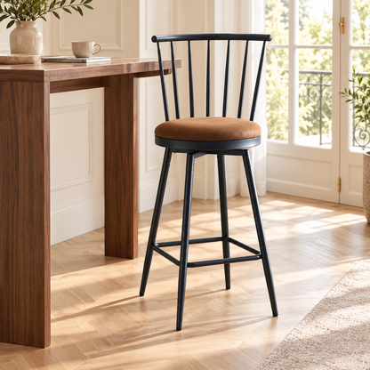Tabouret marron à dossier à barreaux devant une console haute en bois dans un intérieur lumineux à moulures et parquet en chevrons.