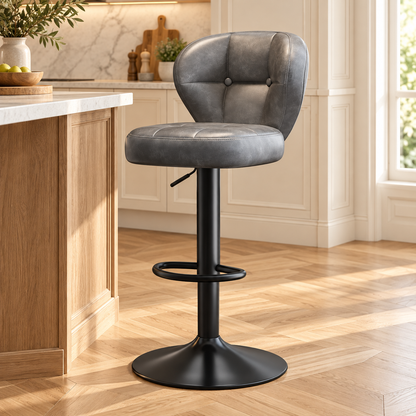 Tabouret vintage gris pied noir repose pieds, dans une cuisine lumineuse.